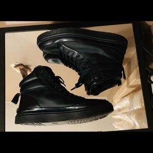 Dr. Marten’s Airwair - Black Hi-tip Lamar Boots.